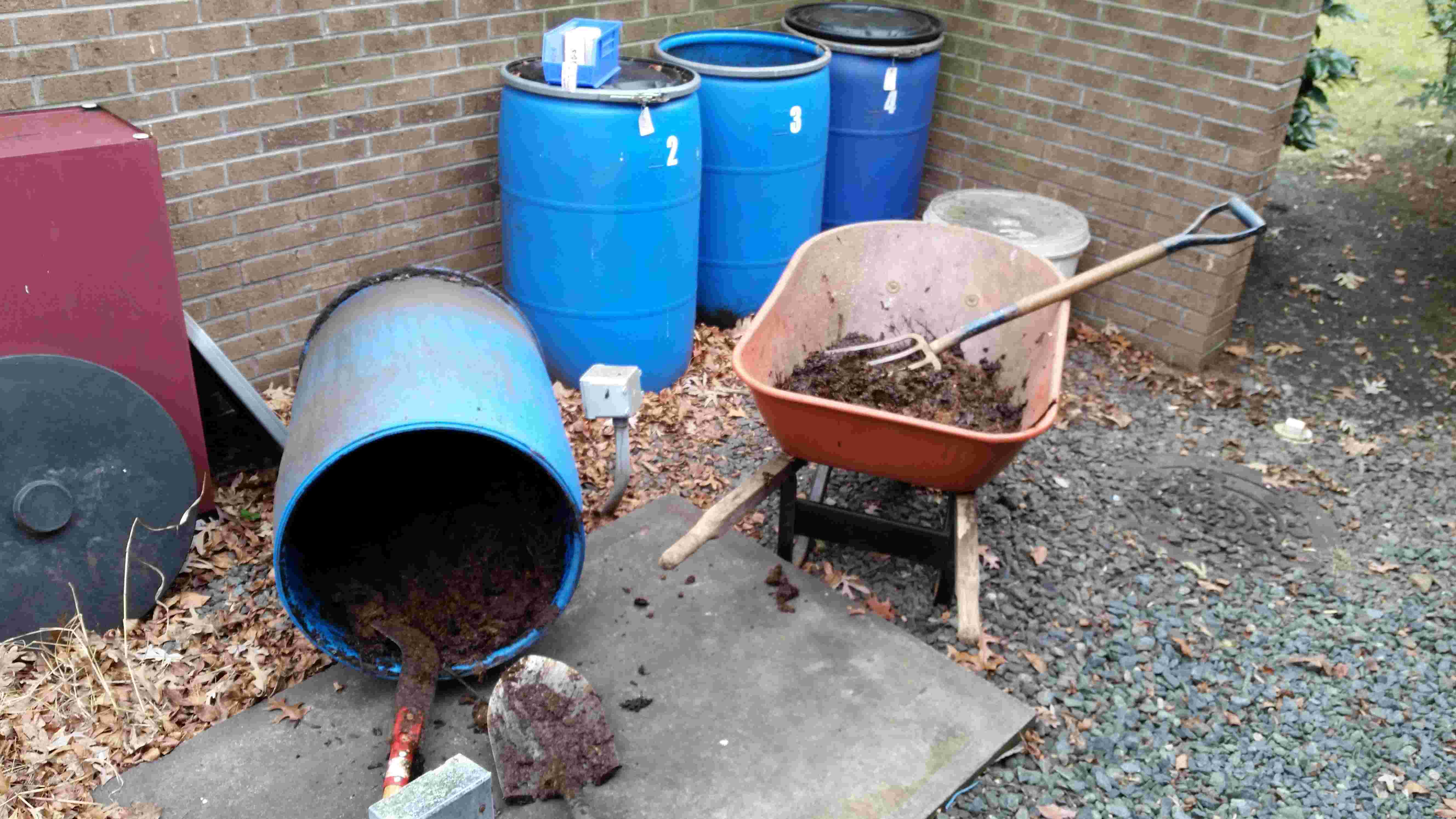 Emptying a compost barrel